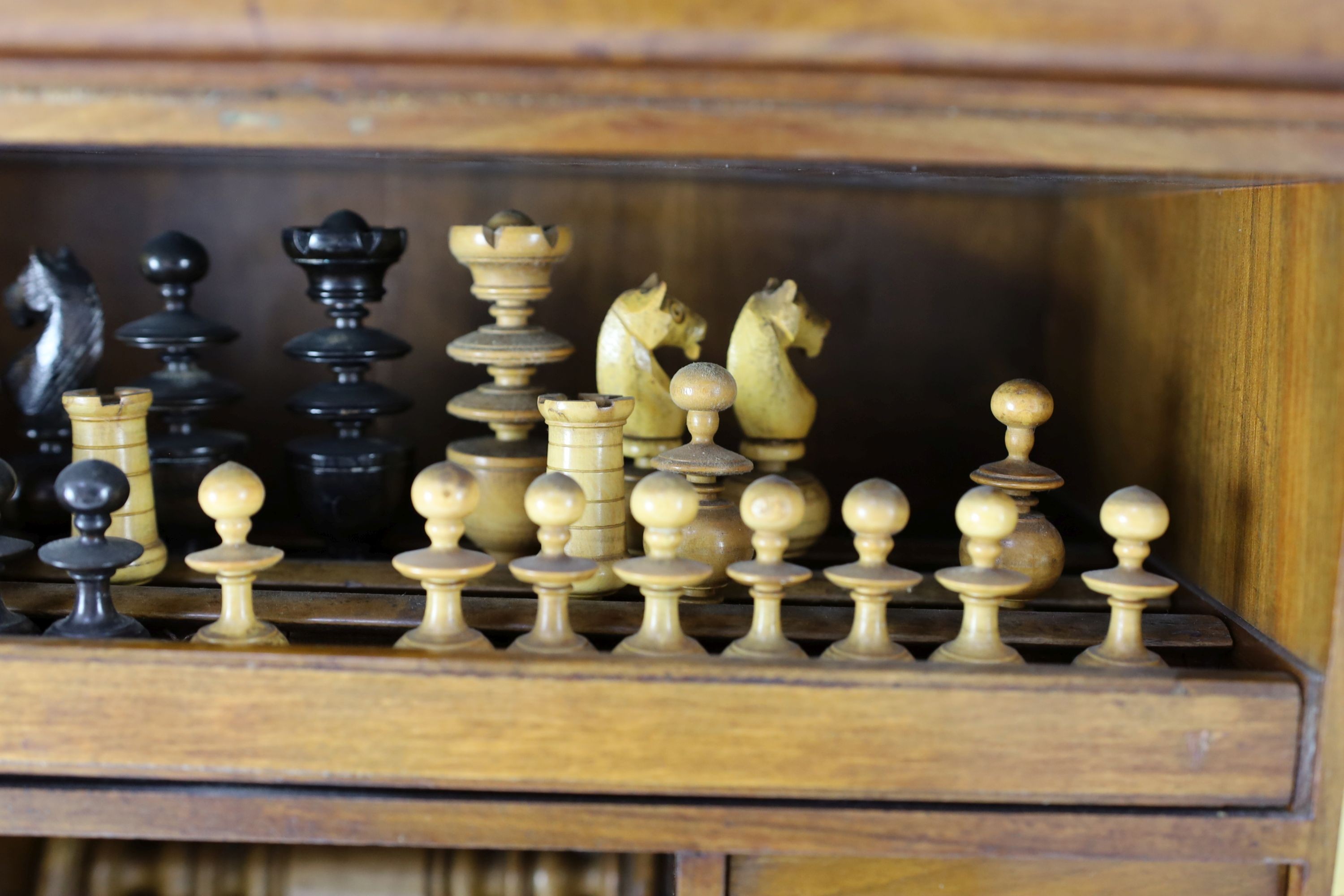 A late 19th century gilt metal mounted walnut games cabinet, W.40cm D.19cm H.49cm